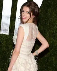 Actress Anna Kendrick wearing a classic tendril twist at the 2010 Oscars After Party - DailyCeleb.com - All Rights Reserved