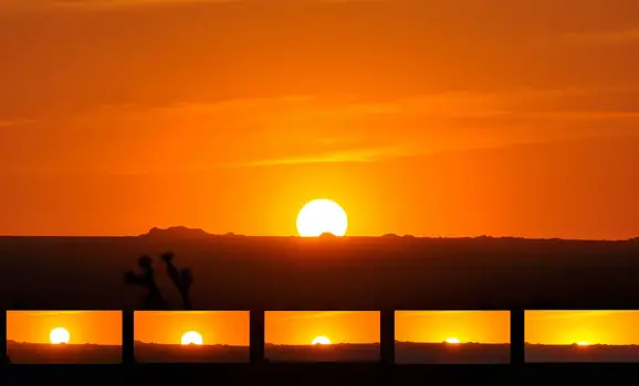 Sun  at sunset, as observed from the high plains of the Mojave Desert - Wikipedia - All Rights Reserved