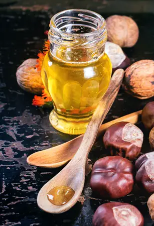 At-Home Hair Care Solutions To Try For Shiny, Fatter And Brass Free Strands -Glass jar of honey nuts - Hairboutique.com