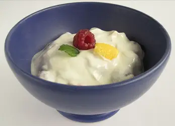 Bowl Of Yogurt With Fruit Embellishment