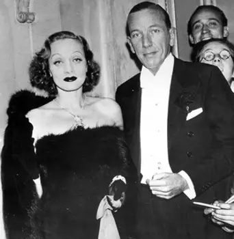 Pictured: Noel Coward with Marlene Dietrich, 1937. Credit: Courtesy of Photofest