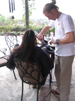 Robert Hallowell Doing Hair On The Patio Of His Home Weaing Famous Man Bun - Photo by Karen Marie Shelton - Hairboutique.com All Rights Reserved