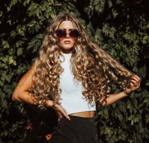 Lightening Fast Hair Growth Lies - Long Naturally Curly - averie woodard - Unsplash