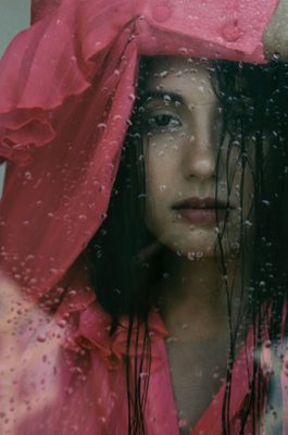 Many Reasons Exist For Dry, Damaged Hair -Girl In Waterdrops - Photo By Katsiaryna Endruszkiewicz - Unsplash