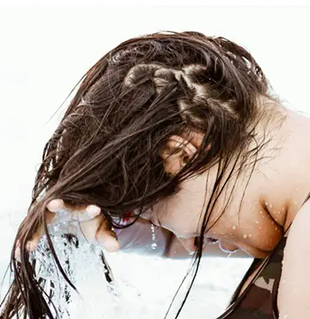 A Wet Wash Trick To Help Revive Dry, Frizzy, Damaged Hair - Erick Larregui - Unsplash - All Rights Reserved