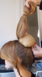 Insertion Of Hair Foam Or Hair Ratt To Create Bun Shape