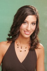 Long Brunette Hairstyle With Curled Edges And Side Swept Fringe Off A Side Swept Part